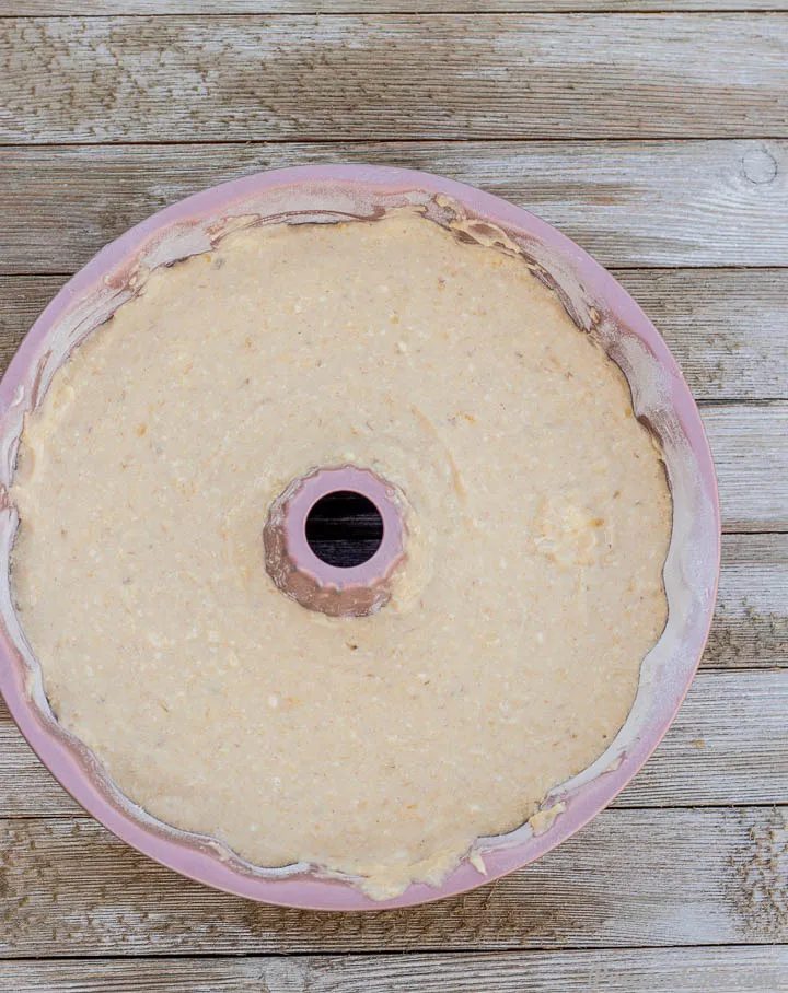 Banana bread in bundt pan batter.