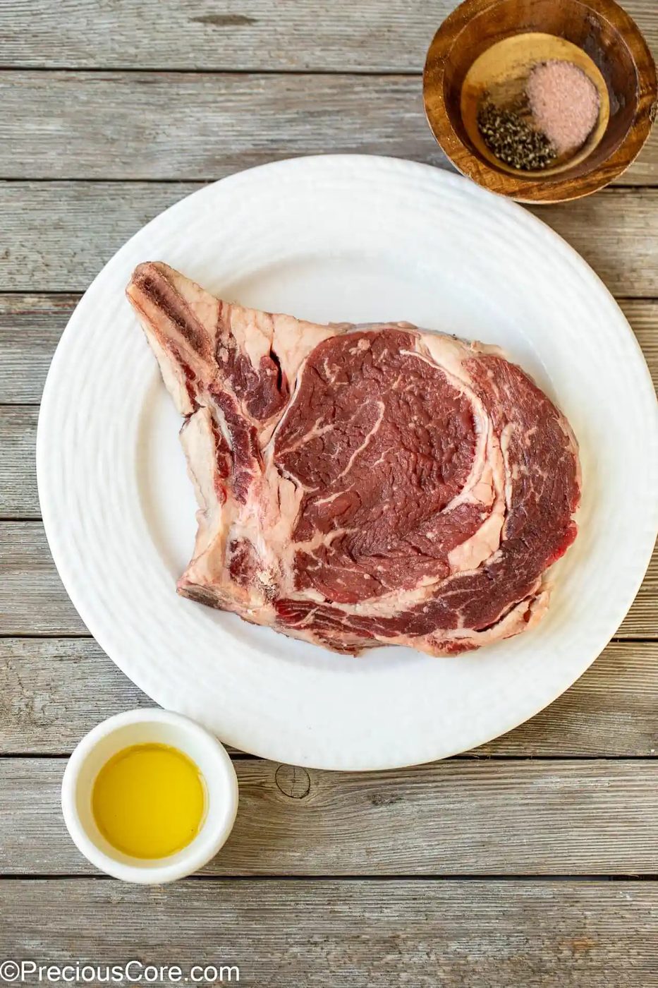 Steak, salt, black pepper, and olive oil.