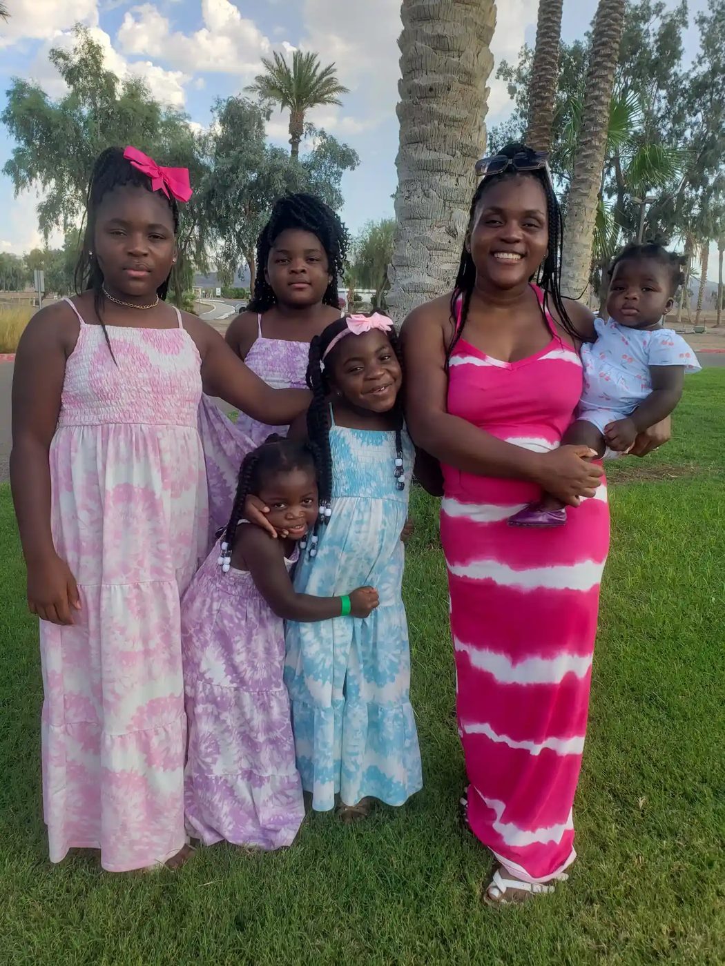 Me and our girls in dresses for dinner