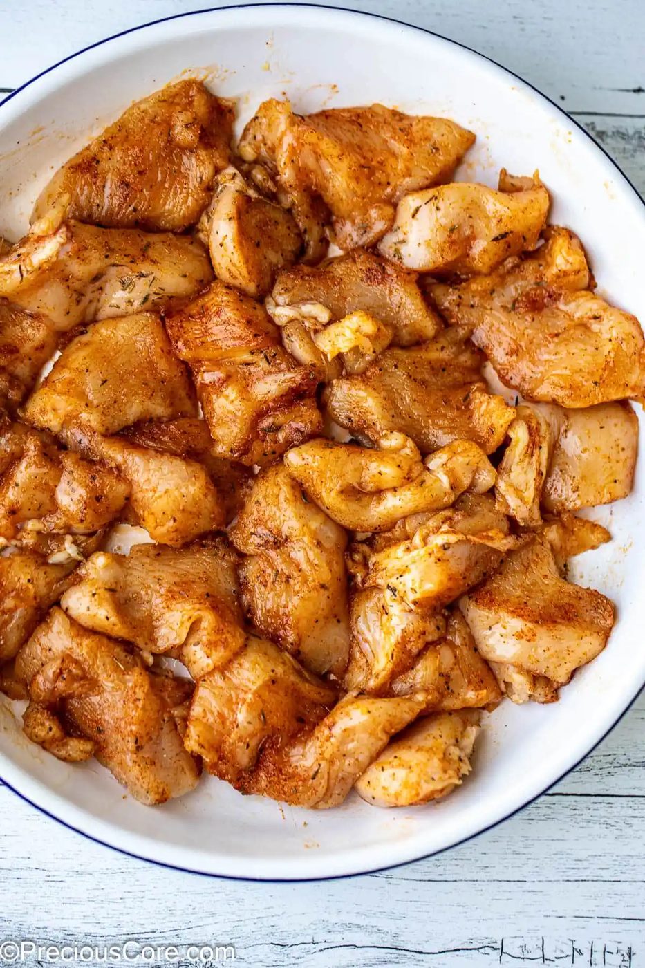 Seasoned boneless skinless chicken pieces.