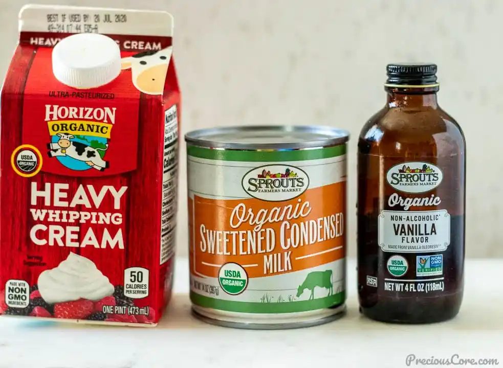 heavy whipping cream, sweetened condensed milk and vanilla extract for making vanilla ice cream.