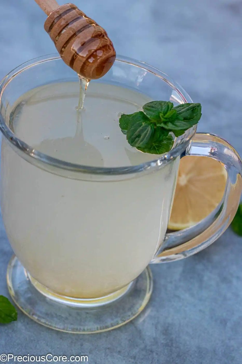 A mug of honey lemon tea.