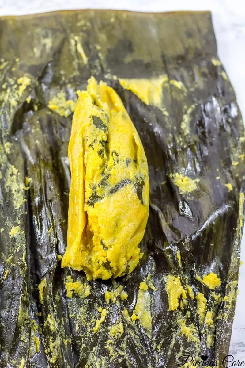 koki corn on a banana leaf