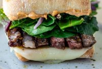 Juicy Ribeye Steak Sandwich Recipe with Caramelized Onions