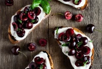 Whipped Ricotta Toast Topped with Balsamic Cherries