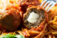 Cheesy Mozzarella-Stuffed Meatballs with Marinara Dip