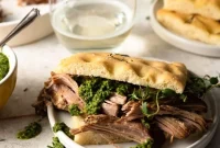 Slow-Cooked Italian Pulled Pork Shoulder with Herbs and Tomatoes