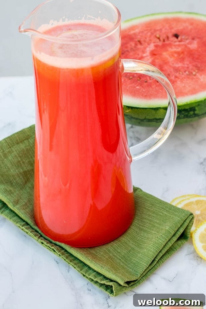homemade watermelon lemonade in a glass jar