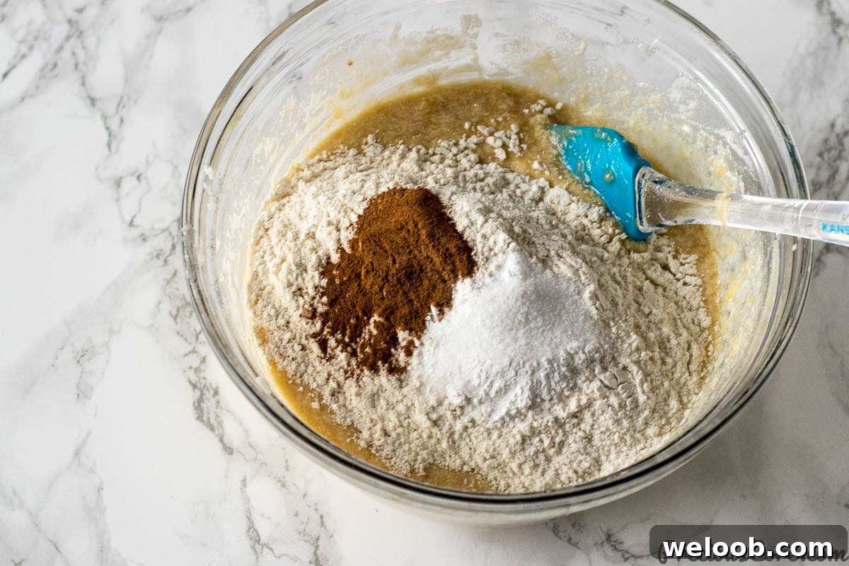 Adding dry ingredients for Easy Moist Banana Bread Recipe