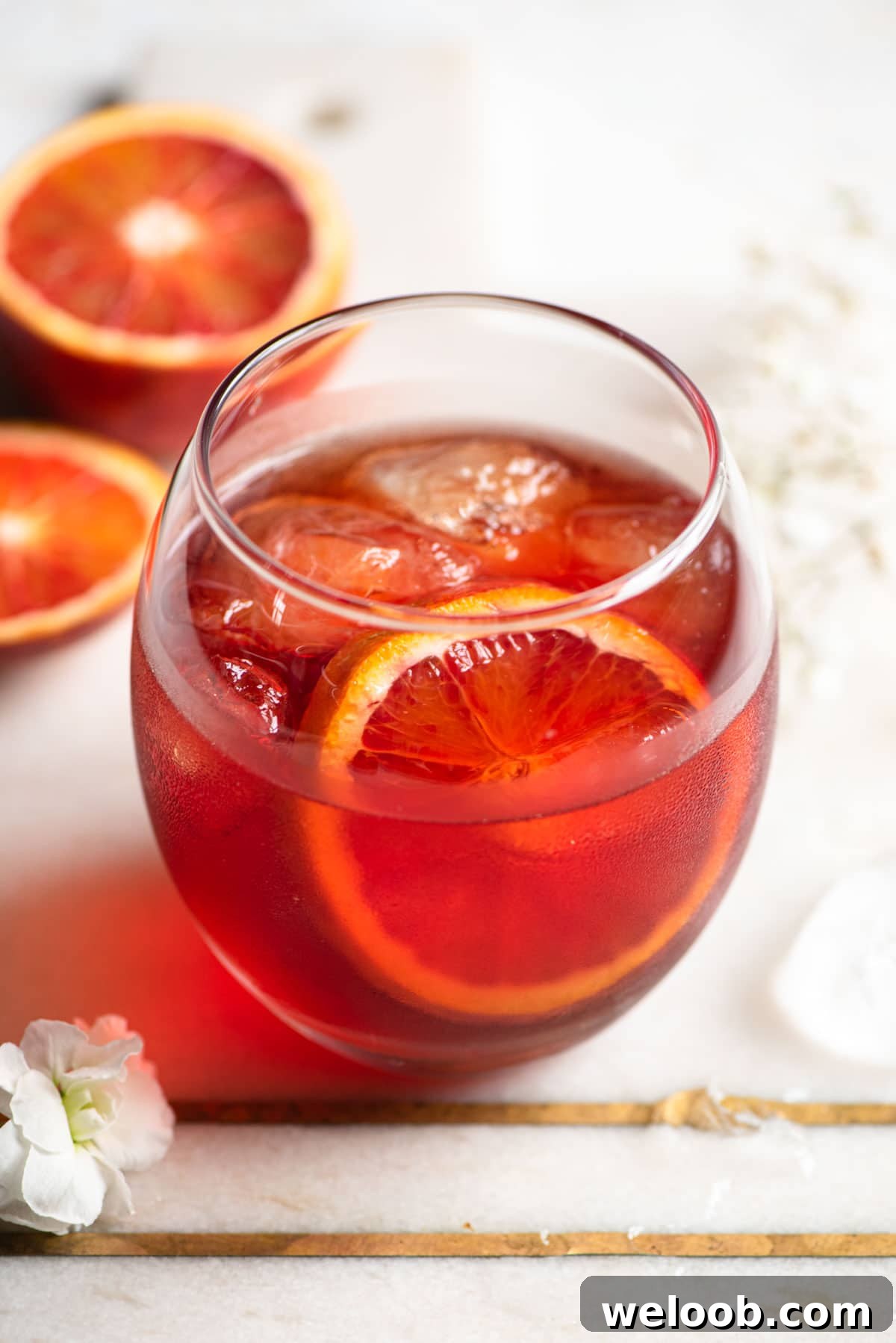 Negroni Sbagliato Cocktail Recipe and Guide 5 A close up of a Negroni Sbagliato in a round glass