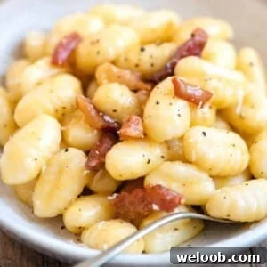 A close up of gnocchi carbonara