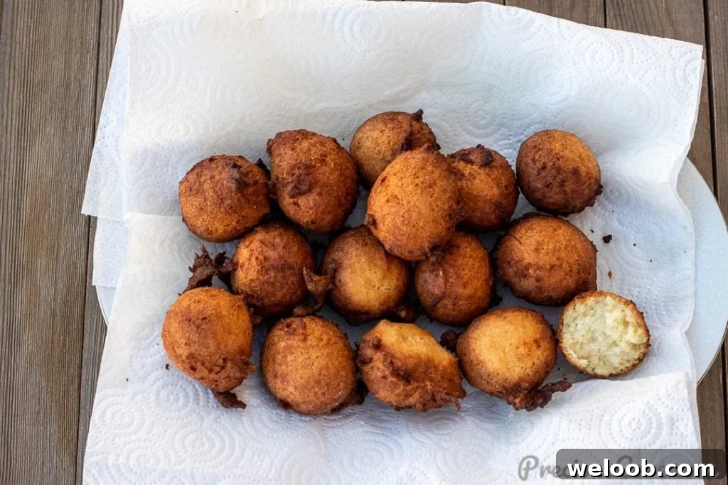 Landscape picture of coconut doughnuts with bite taken out of one
