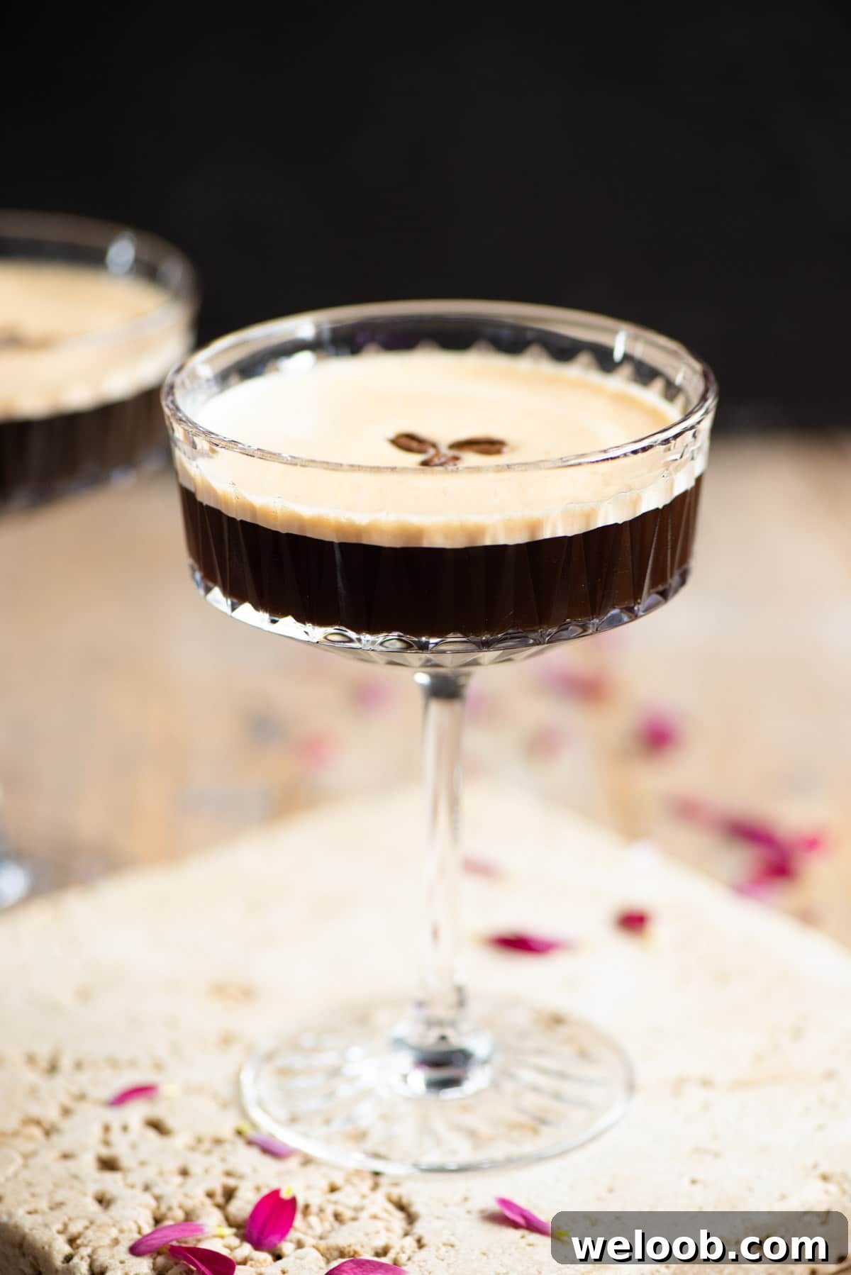 An espresso martini in a cocktail glass
