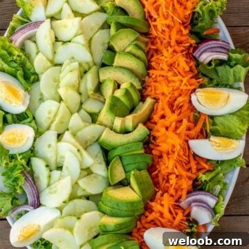 Lettuce, cucumbers and other vegetables on a platter