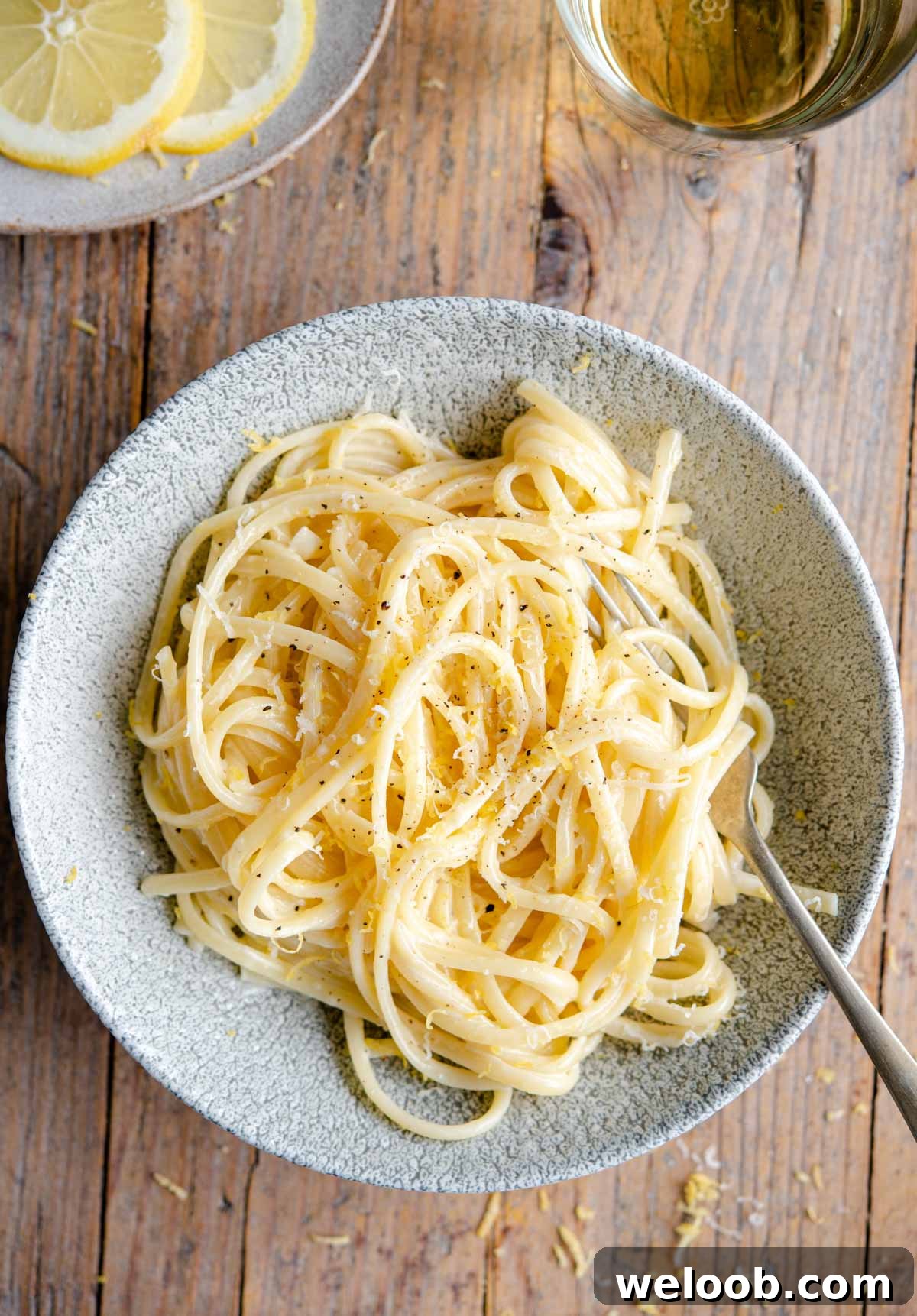 An overhead shot of pasta al limone in a bowl