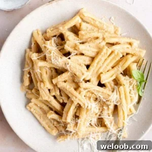 An overhead shot of pasta with pesto alla trapanese