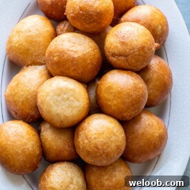 Puff Puff on a white tray.