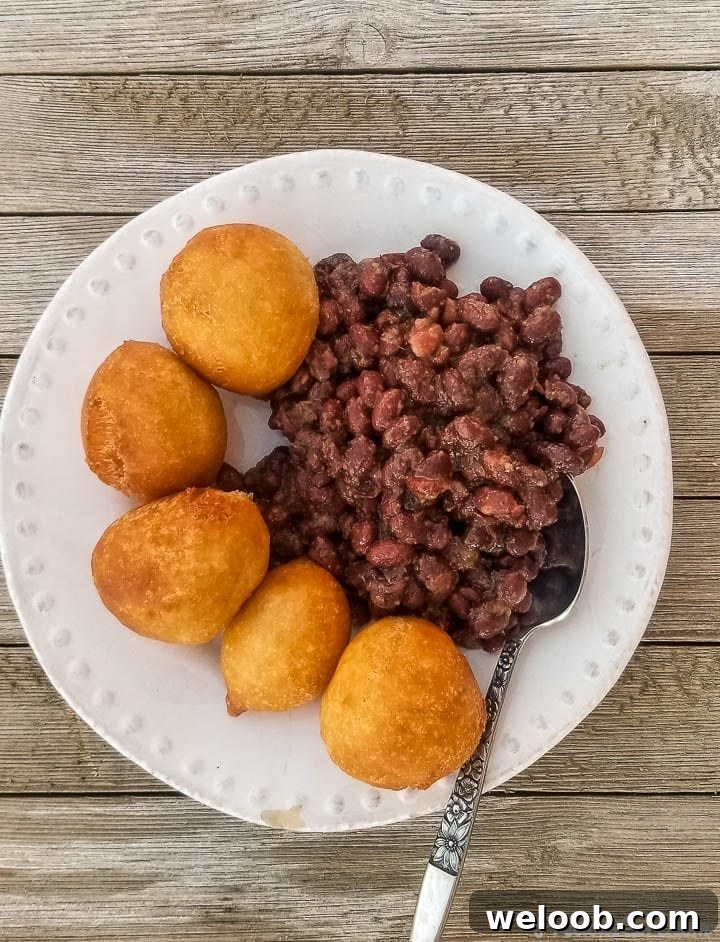Puff puff and beans on a plate