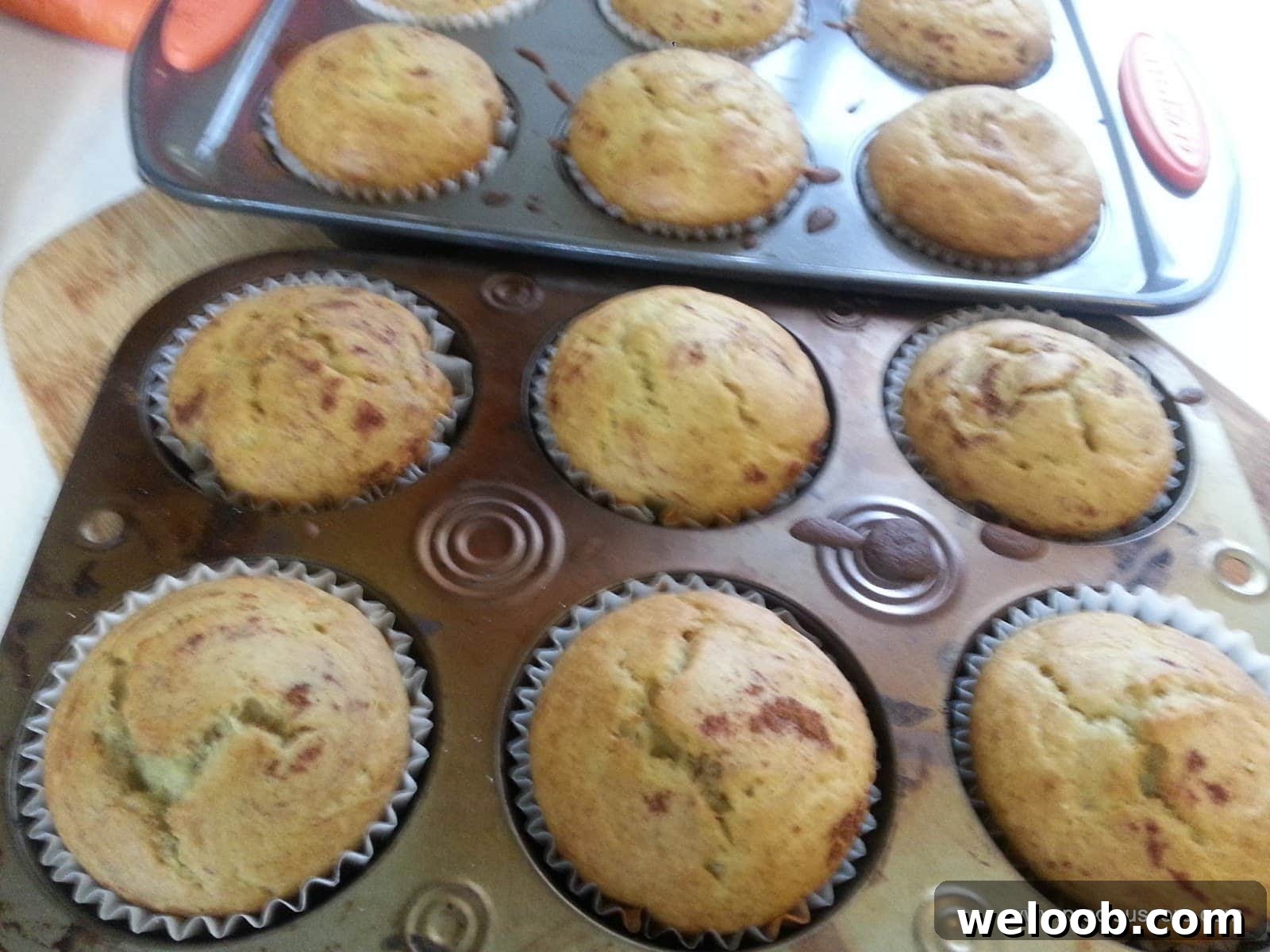 Muffin pans full of Cameroon banana cakes.