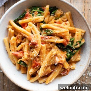 A close up of a creamy Nduja pasta in a bowl