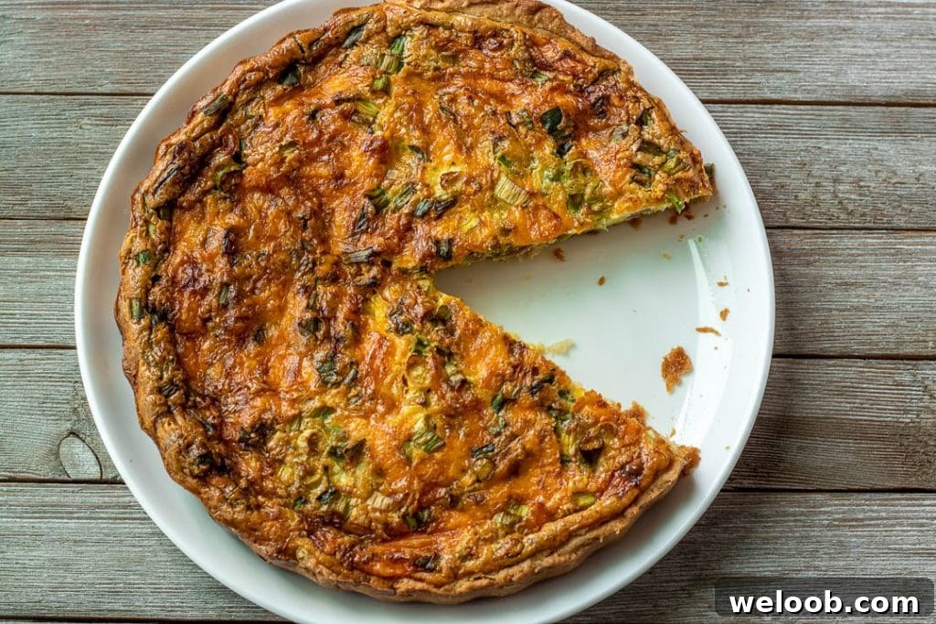 Quiche with a slice cut out