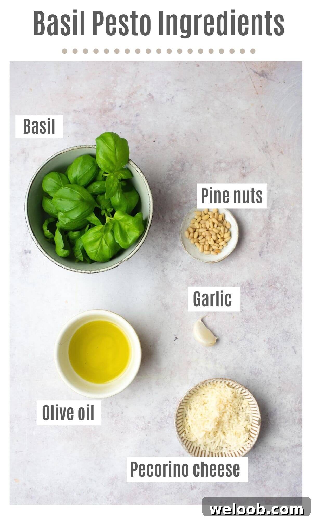 An overhead shot of all the ingredients you need to make basil pesto