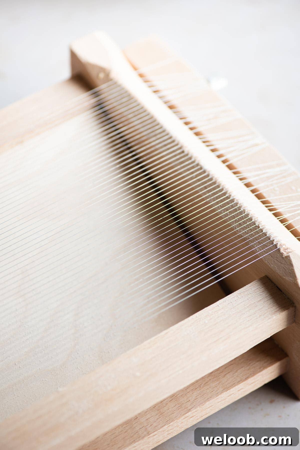 A close up of La Chitarra (guitar) pasta tool