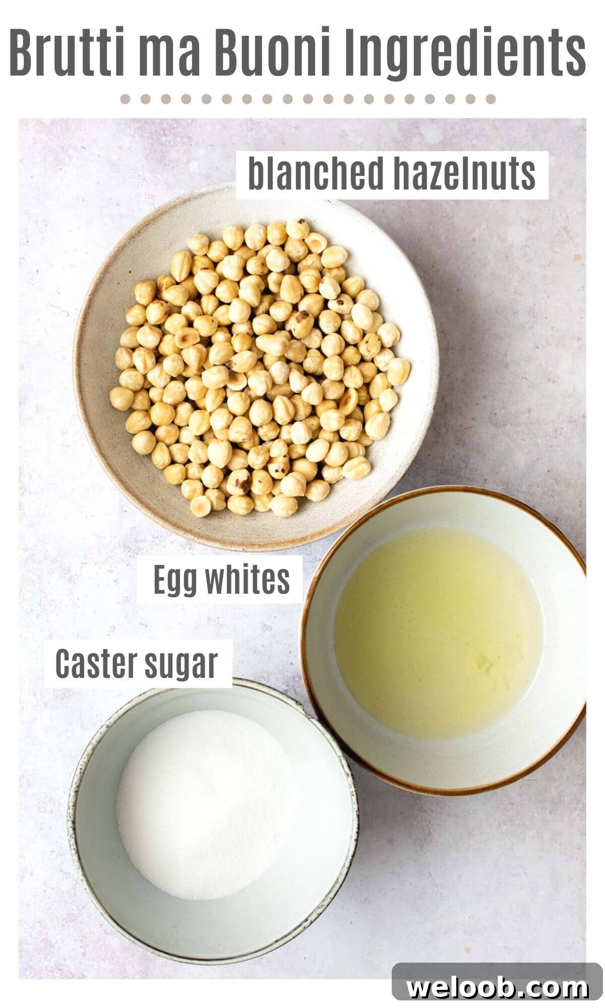 An overhead shot of three bowls containing blanched hazelnuts, egg whites and sugar