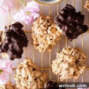 A close up of both original and chocolate brutti ma buoni on a gold cooling rack
