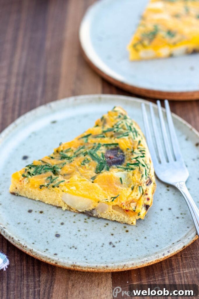 Slice of potato frittata on a plate