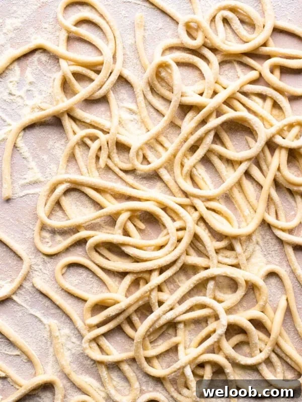 An overhead shot of homemade pici pasta