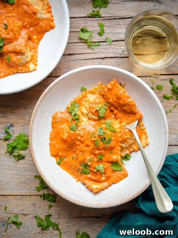 An overhead shot of lobster ravioli in a bowl