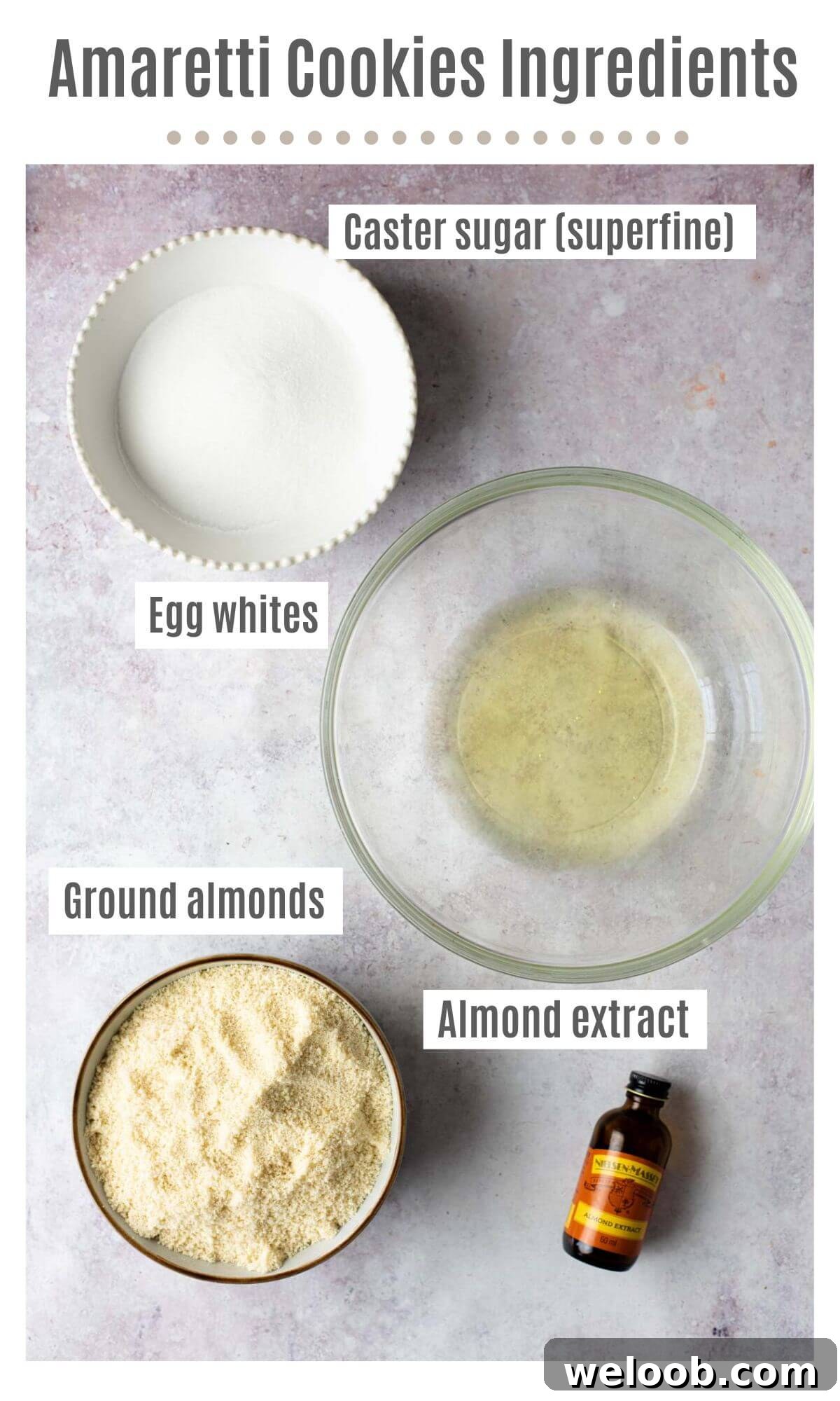 An overhead shot of all the ingredients needed to make amaretti cookies; caster sugar, egg whites, ground almonds and almond extract.
