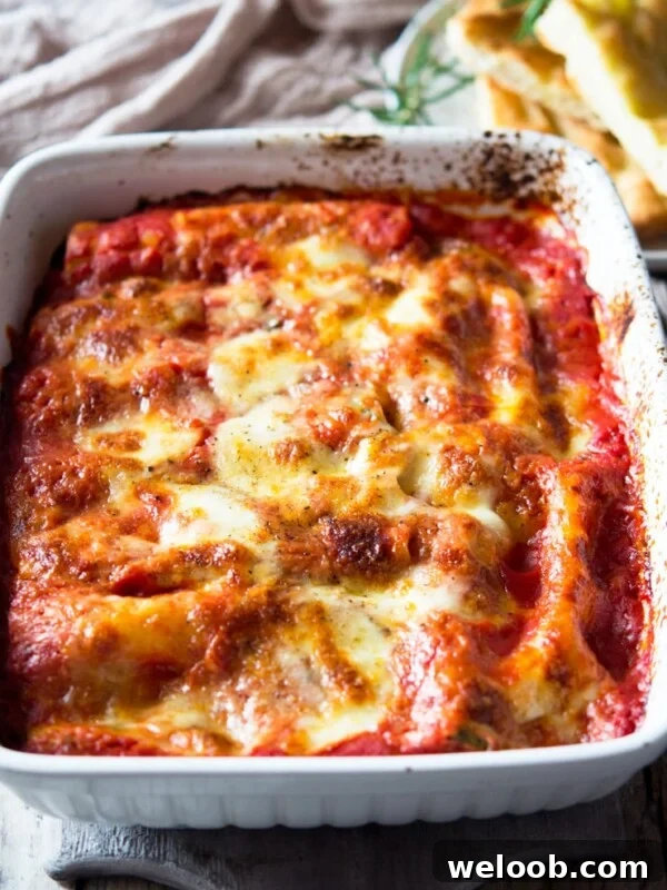 spinach and ricotta cannelloni in a large baking dish
