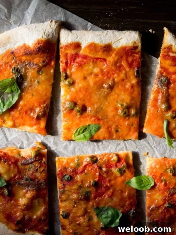 A close up of anchovy pizza (pizza napoli) with capers