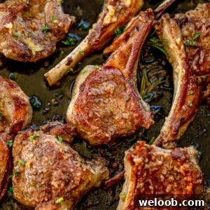 Pan seared lamb chops in a cast iron skillet.