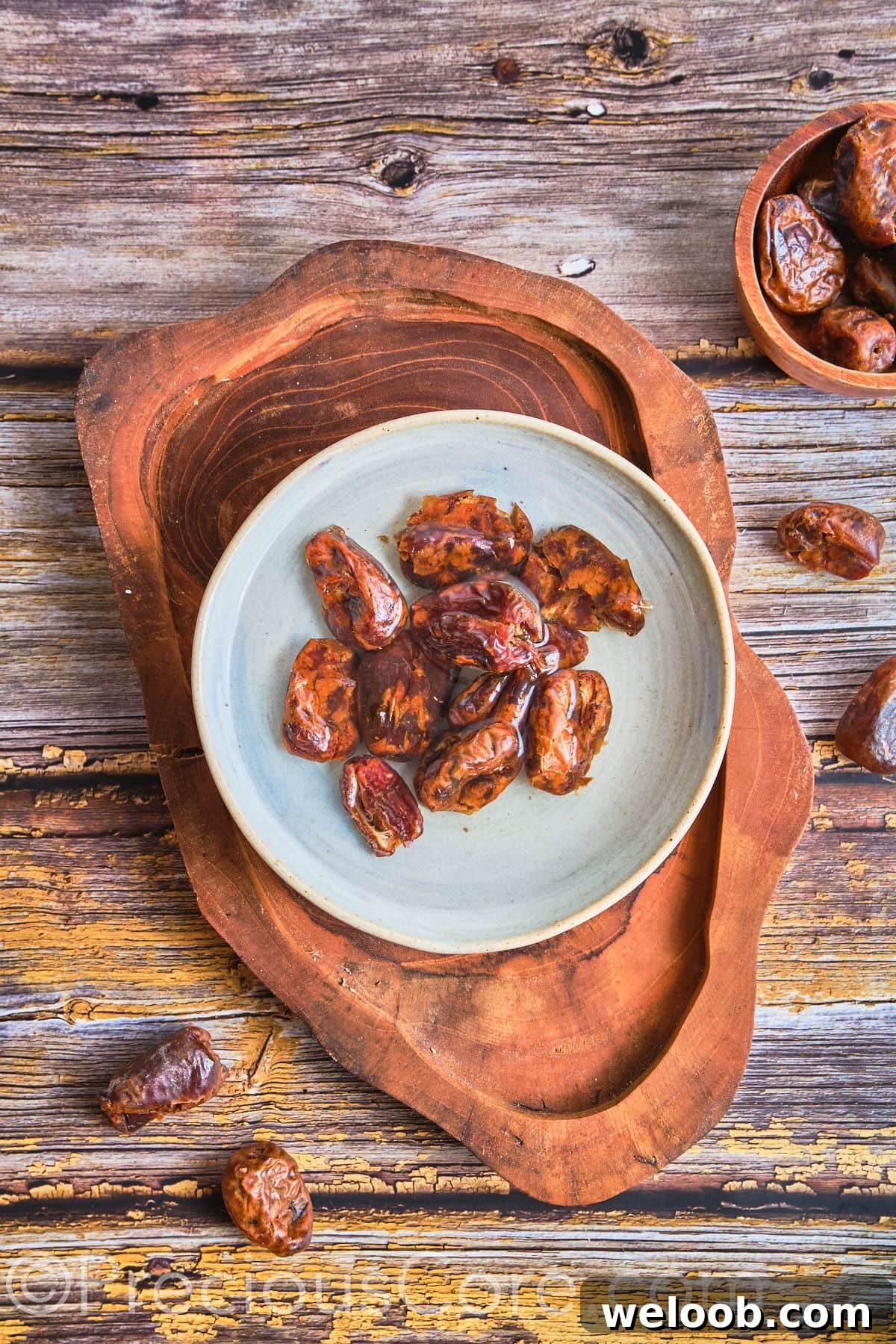 Dates soaking in a bowl of water.