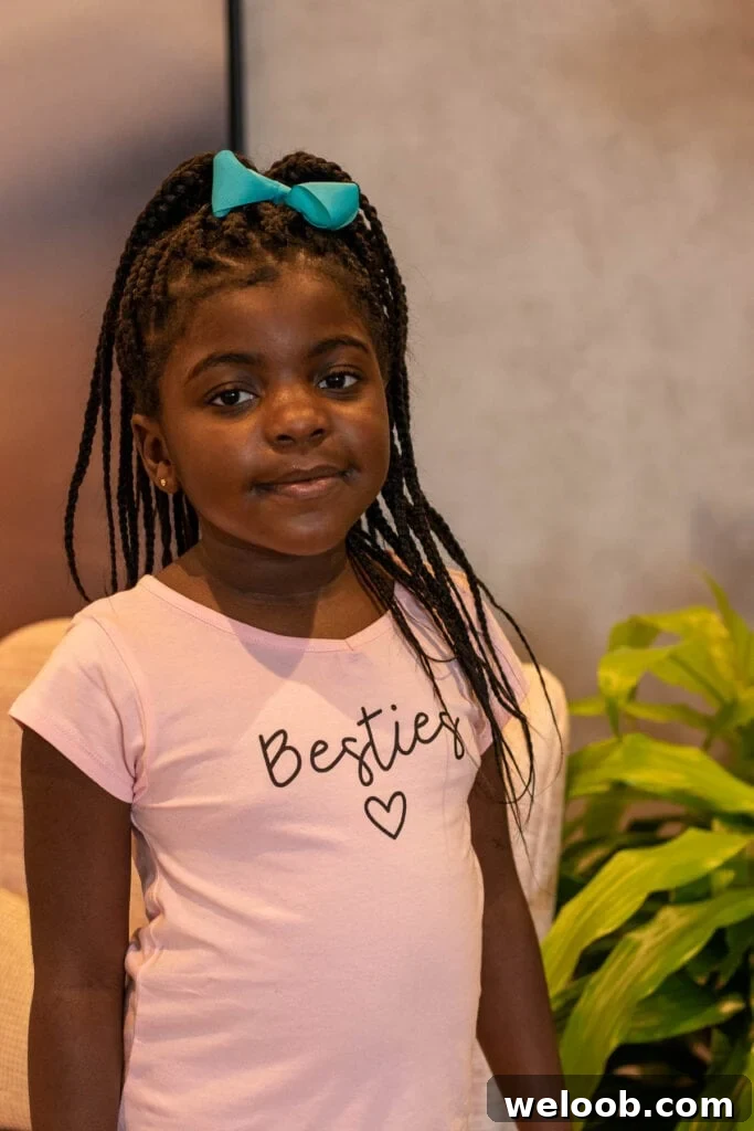 My daughter in a pink t-shirt.