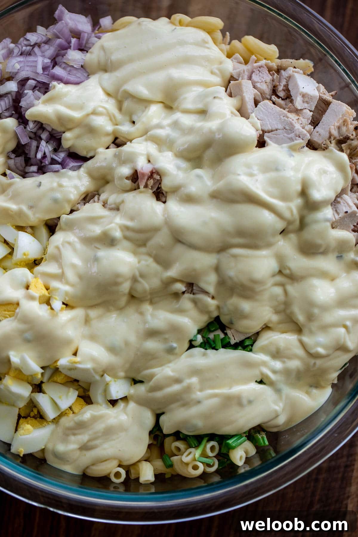 Creamy dressing over salad ingredients
