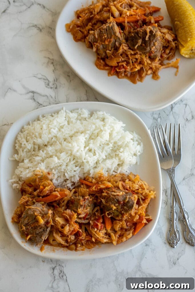 Cabbage Stew served with rice and plantains