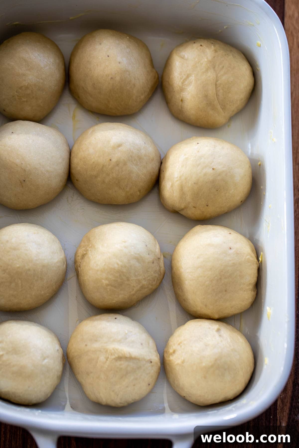 Bread Rolls formed into a ball and placed in a baking dish