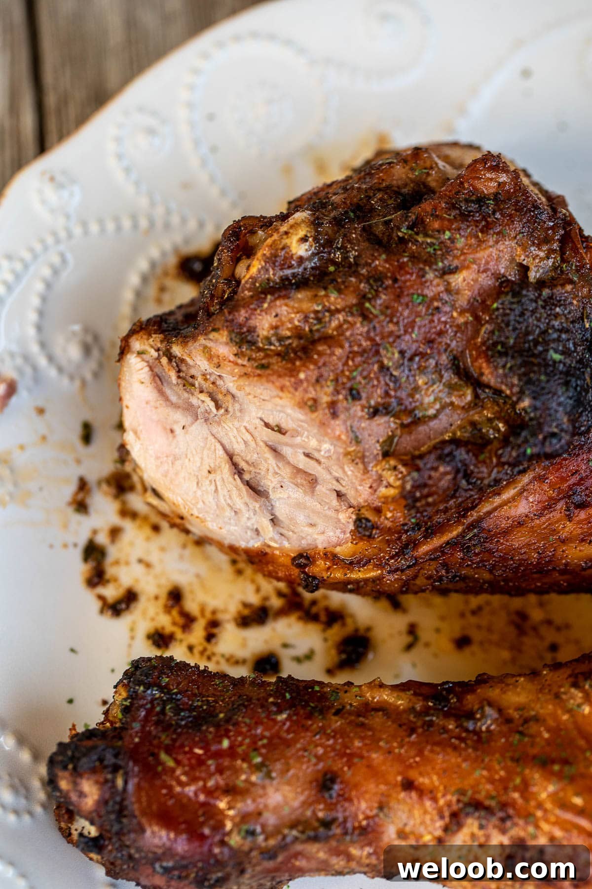 A turkey drumstick cut to show juiciness.