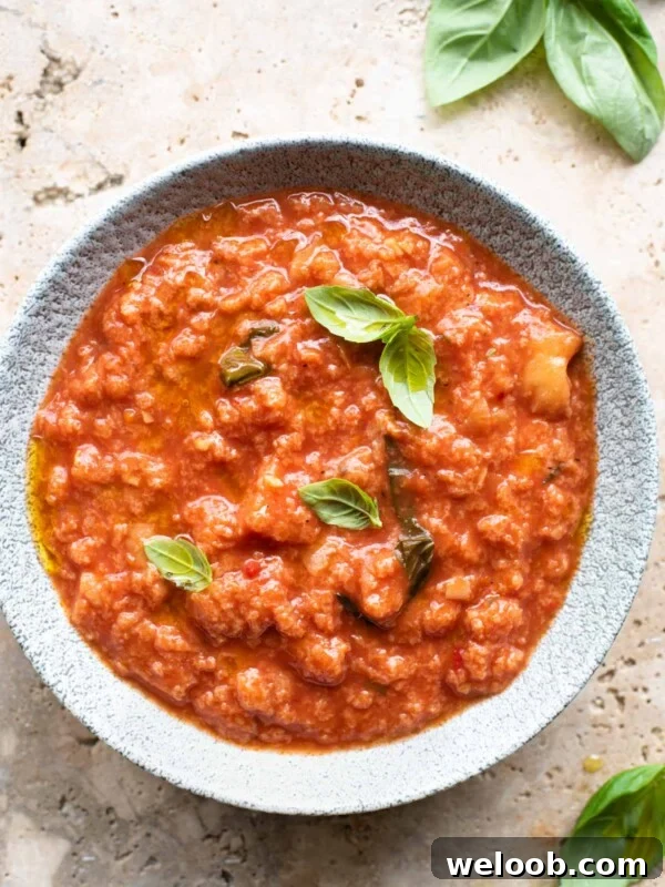 An overhead shot of a bowl of Pappa al Pomodoro Italian bread soup
