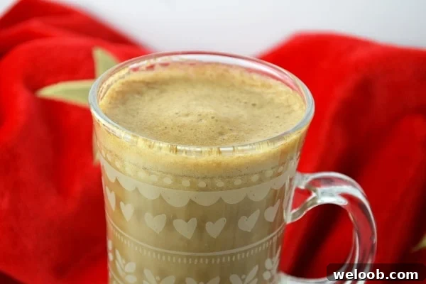 A close up of banana milk coffee in a mug