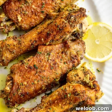 Lemon pepper turkey wings on a serving platter.