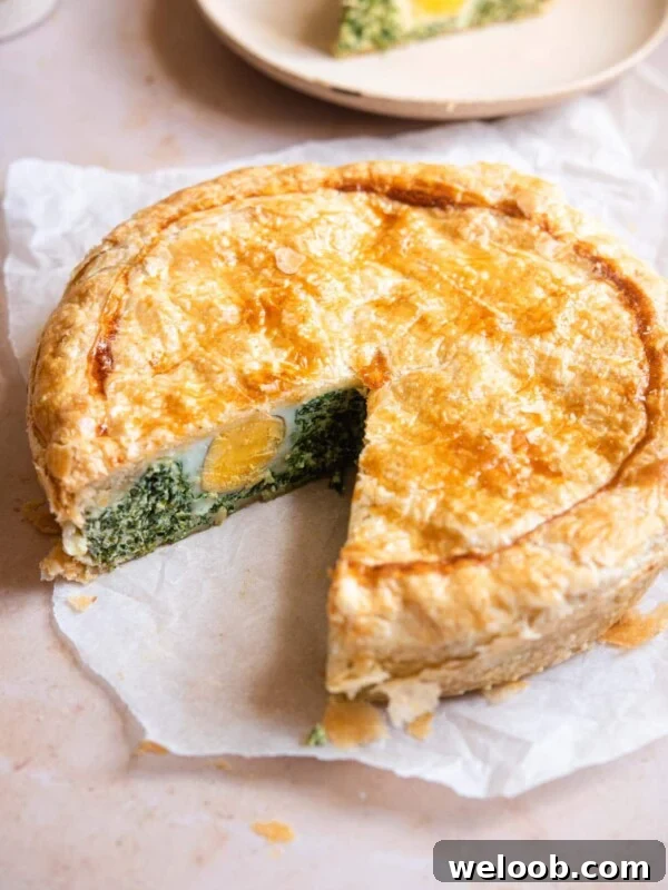 Torta Pasqualina with a slice cut out