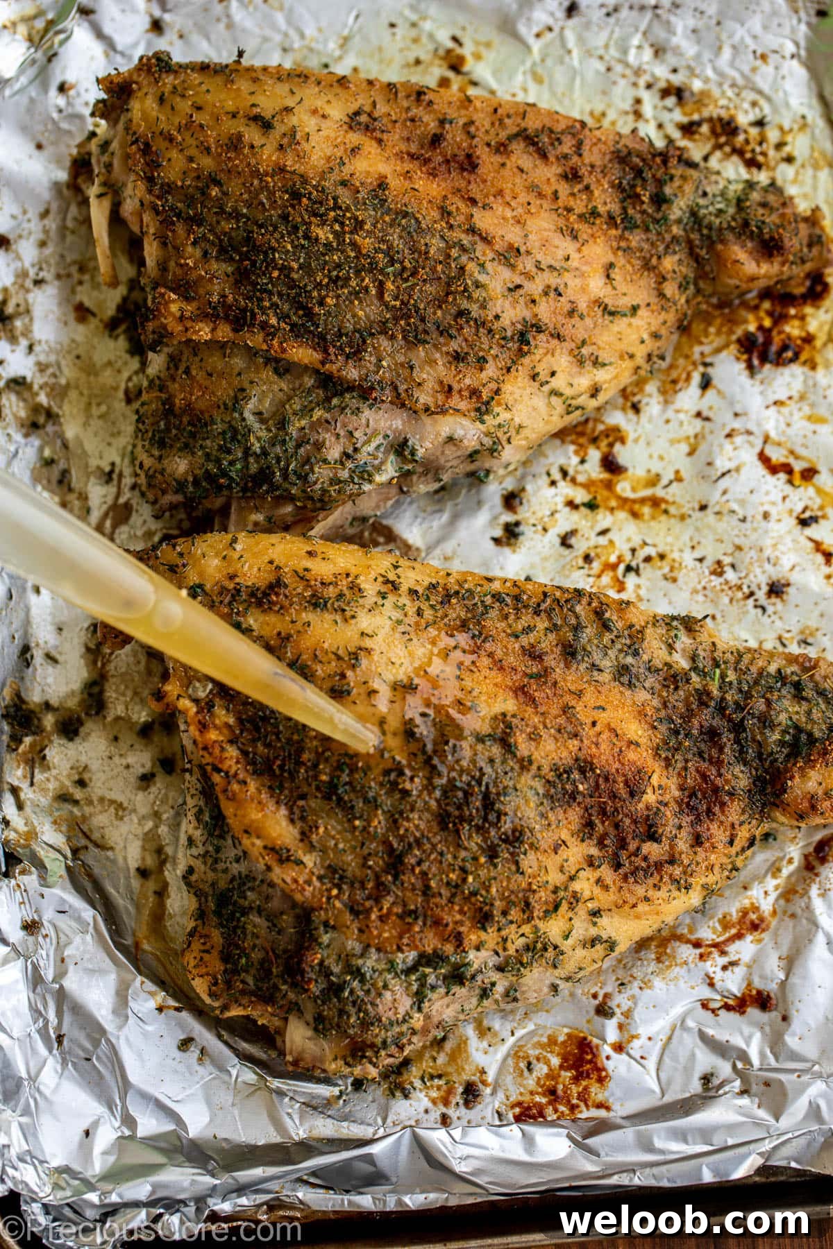 Basting over a turkey thigh.