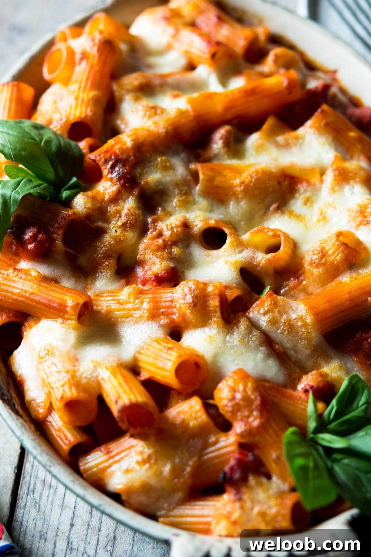 A close up of cheesy baked pasta