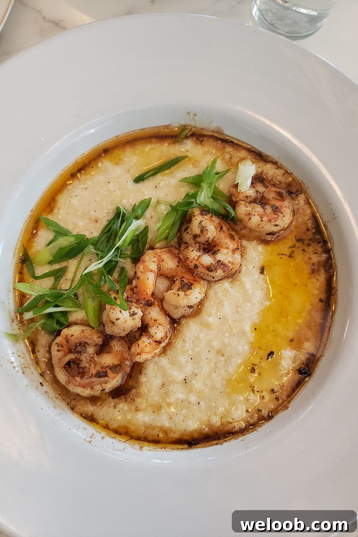 A plate of shrimp and grits at a restaurant in Austin, Texas.