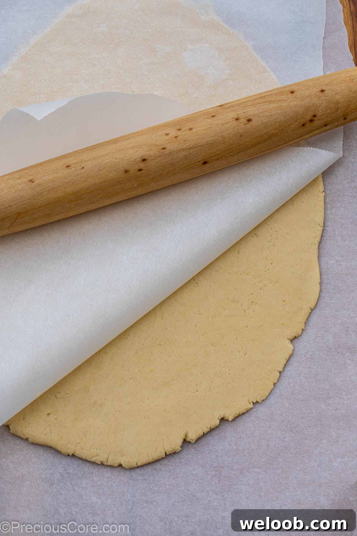 Cookie dough rolled to a quarter inch thick.